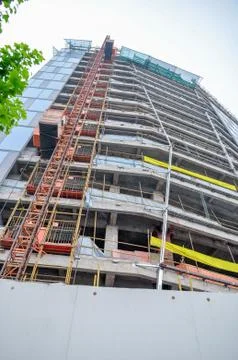 Construction elevator at a building under construction Stock Photos