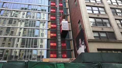 Construction Elevator On Glass Building Video stock 52550081