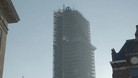 Construction elevator going down from old Dom church tower in Utrecht, the Stock Footage 164190310