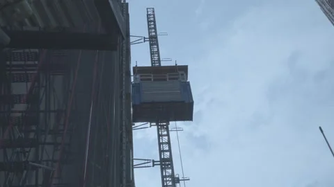Construction Elevator on High-Rise Building Stock Footage 303638718