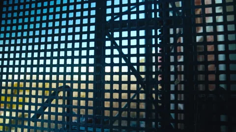 A construction elevator moves along the outside of an unfinished building Stock Footage 271331370