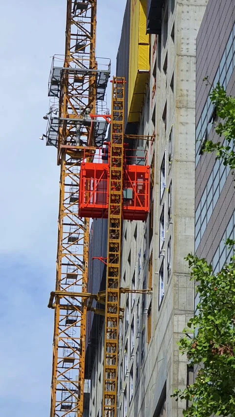 Construction Elevator Moving Up at Gwacheon High-Rise Building Site Stock Footage 317807034