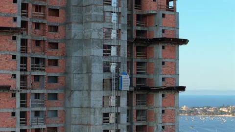 Construction Elevator Operating on High-Rise in Penha, Brazil Stock Footage 314268719