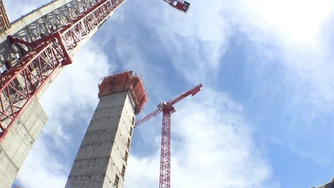 Construction Elevator Tower Crane Tilt down to Materials Stock Footage 81457506