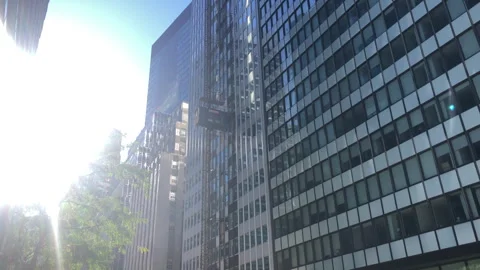 Construction Elevators Travel Up and Down on Outside of Building Stock Footage 254847025