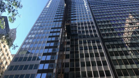 Construction Elevators Travel Up and Down on Outside of Building Stock Footage 254847344