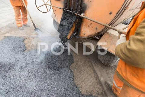 From Construction Emergency Vehicles Poured Asphalt, Road Repair