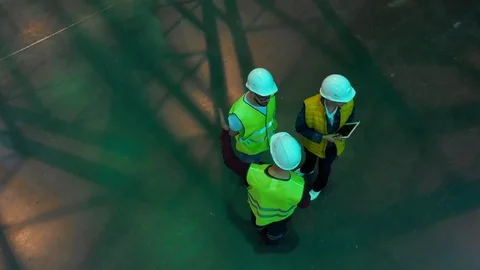 Construction engineer and female foreman with helmet and waistcoat Stock Footage 113091909