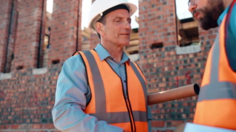 Construction, engineer and handshake outdoor with clipboard, building schedule Stock Footage 336224326