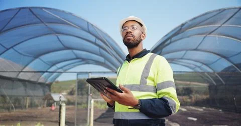 Construction, engineer and man with tablet for agriculture, project development Stock Photos