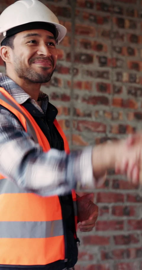 Construction, engineer and shaking hands with man for partnership, deal or smile Stock Footage 336206570