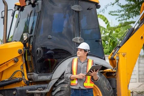 Construction Engineer With Backhoe 스톡 사진