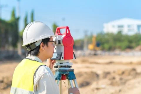 Construction engineer checking construction site Photos