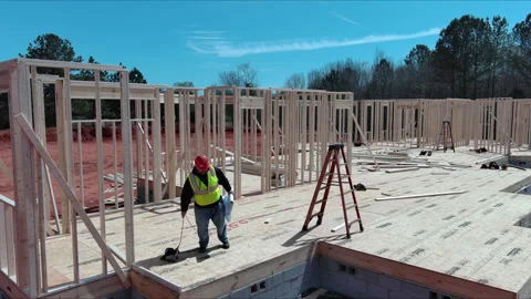 Construction engineer checking quality works of wooden frame using architecture Stock Footage 240984643