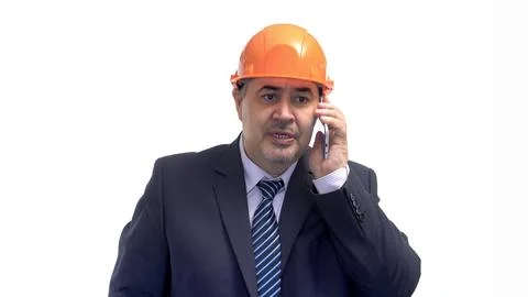 Construction Engineer in Hard Hat Talking on the Phone Stock Photos