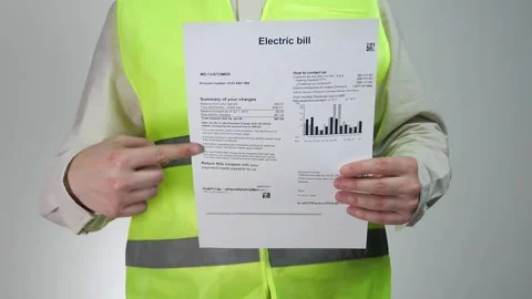 The construction engineer holds a construction diagram Stock Footage 311475631