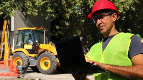 Construction Engineer With Laptop Computer Stock Photos