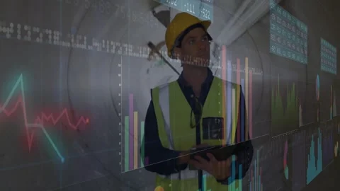 Construction engineer scrolling tablet in tunnel and monitoring data charts Video stock 329511737