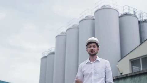 Construction engineer talks about his project Stock Footage 79570471