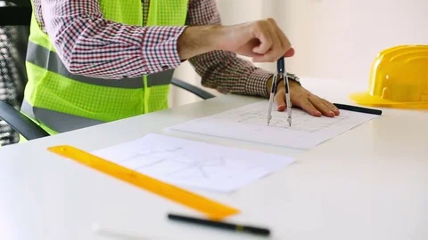 Construction engineer using compass drawing tool Stock Footage 85325257