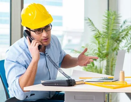 Construction engineer working on new project Stock Photos
