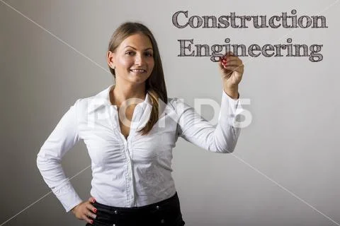 Construction Engineering - Beautiful girl writing on transparent surface Stock Photos