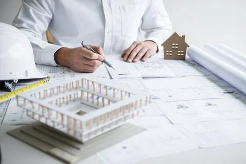 Construction engineering or architect hands working on blueprint inspection i Foto stock