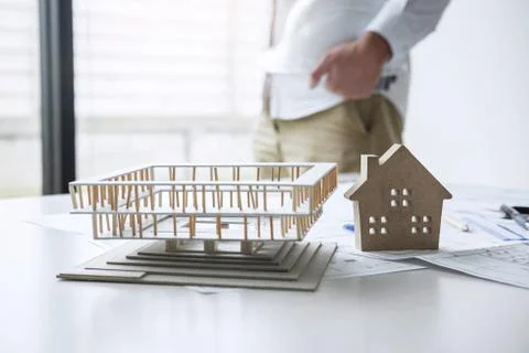 Construction engineering or architect working on blueprint inspection in work Stock Photos