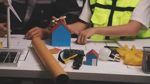 Construction engineers discussing project in office Stock Footage 331670705