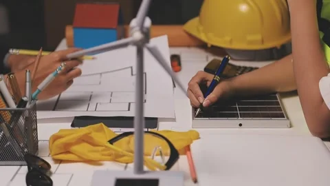 Construction engineers discussing project in office Stock Footage 331670970