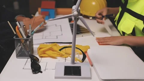 Construction engineers discussing project in office Stock Footage 331670975