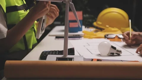 Construction engineers discussing project in office Stock Footage 331671308