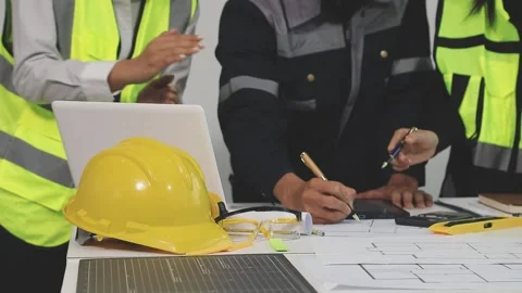 Construction engineers discussing project in office Stock Footage 331672305