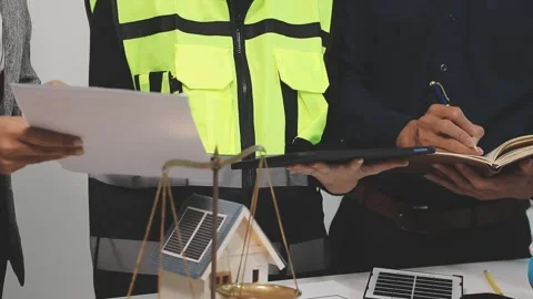 Construction engineers discussing project in office Stock Footage 331682519