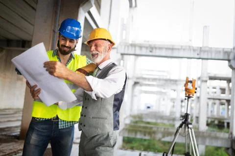 Construction engineers discussion with architects at construction or building 写真素材