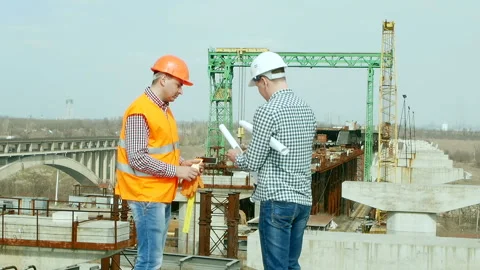 Construction engineers work Stock Footage 90310177