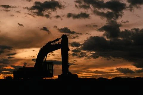 Construction equator on sunset background Stock Photos