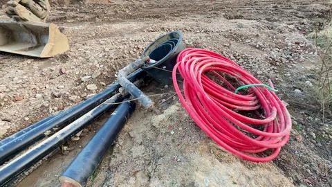 Construction Equipment and Tools Being Used on the Ground for Various Proje.. Stock Photos