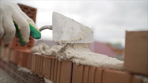 Construction equipment for brick building work trowel. The construction of a  Stock Photos