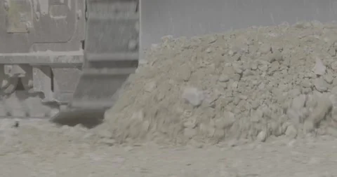 Construction equipment, crawler tractor, construction site, dry soil, sand, dust Stock Footage 308911922