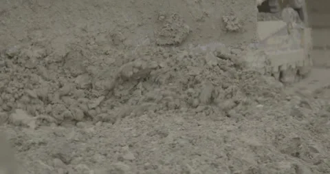 Construction equipment, crawler tractor, construction site, dry soil, sand, dust Stock Footage 308912560
