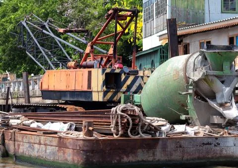 Construction equipment on pontoon Stock Photos
