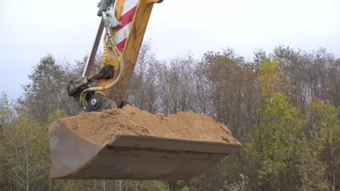Construction, excavator bucket with earth Stock Footage 294180306