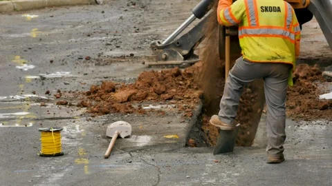 Construction excavator digging road Stock Footage 106365103