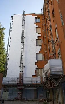 Construction of external building thermal insulation for energy efficiency. Stock Photos