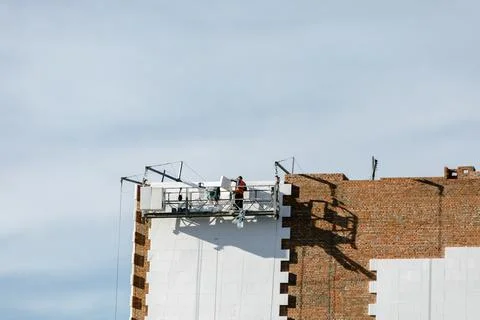 Construction of external wall thermal insulation with rock wool. 스톡 사진