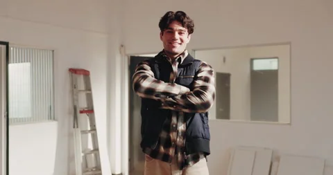 Construction, face and man on site with arms crossed, contractor or about us in Stock Footage 341566921
