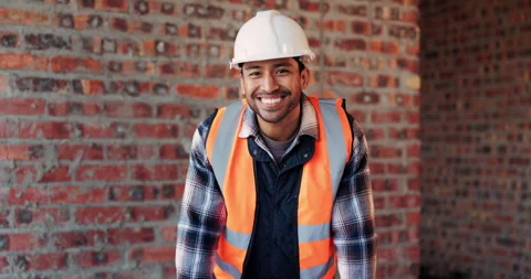 Construction, face and smile of man on building site for industrial or project Stock Footage 336226693
