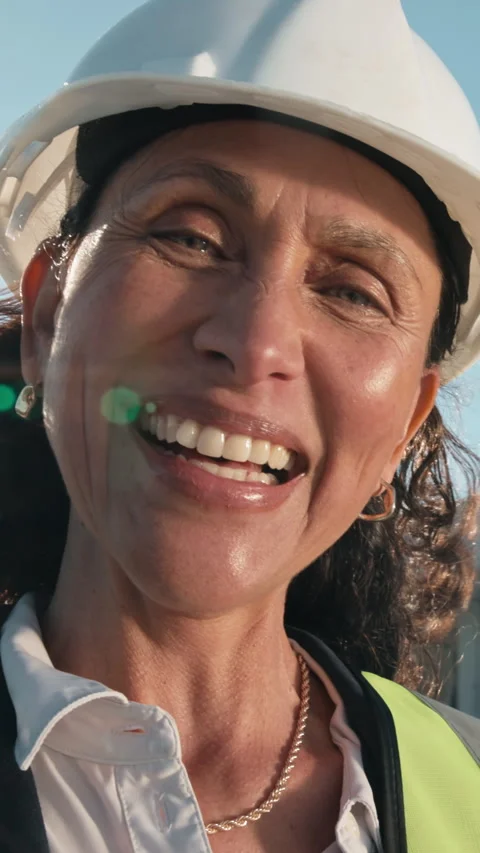 Construction, face and supervisor on site with laugh, contractor and pride in Stock Footage 343488764