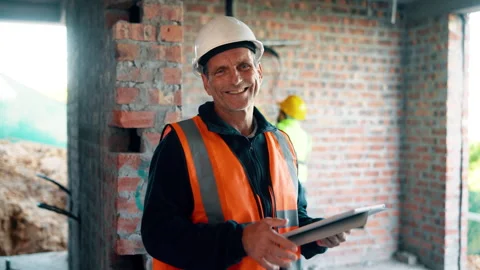 Construction, face and tablet with man on worksite for planning, property Stock Footage 336190742